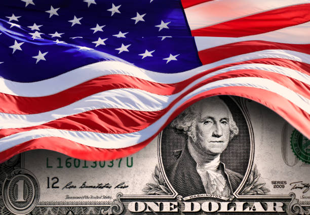 istock Conceptual American flags and one American dollar bill 2163349422