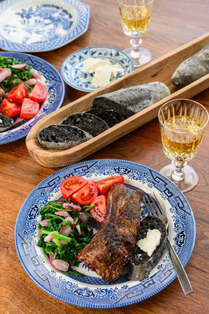 istock Grilled beef rib and vegetables on antique blue willow plate 2163351295