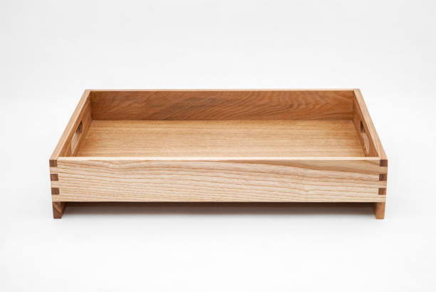 istock Solid ash wood tray with dovetail joints and cutout handles 2163359392