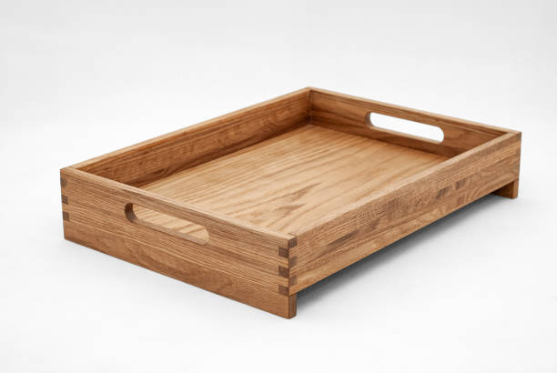istock Solid oak wooden tray with dovetail joints and cutout handles 2163359490