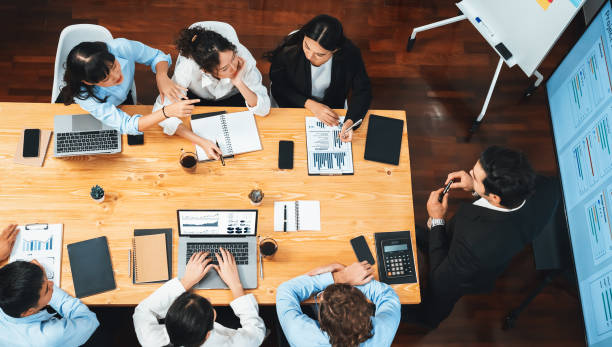 istock Multi ethnic diversity business people and modern business project. Habiliment 2163360848