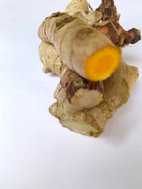 istock spices ginger, turmeric, galangal closeup on white background 2163363560