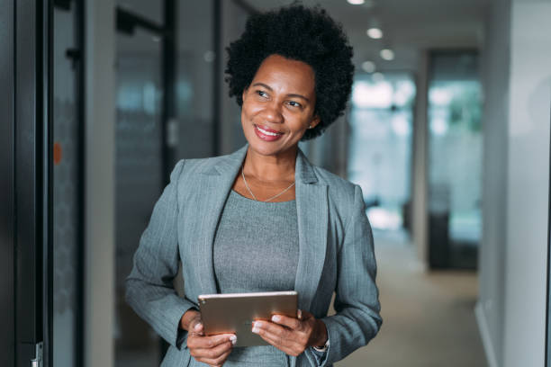 istock Confident businesswoman in modern office. 2163365358