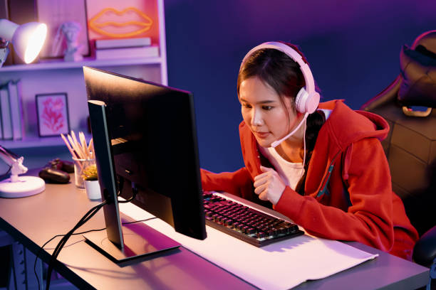 istock Host channel Asian streamer concentrating game wearing headphone. Stratagem. 2163365948