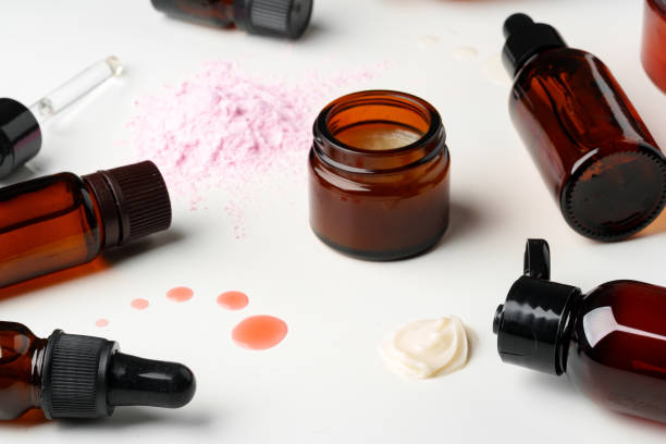 istock Assorted Skincare Products and Powder Spilled on a White Background 2163370677