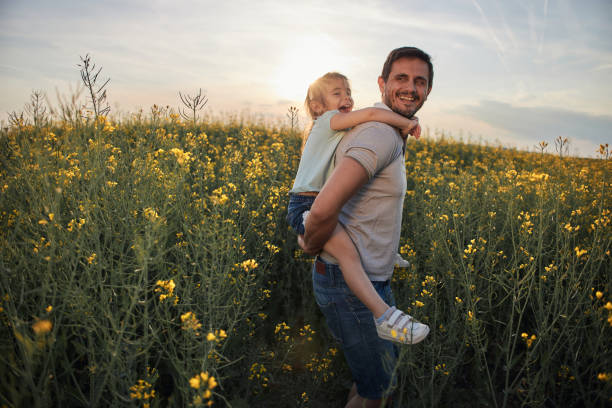 istock Father and daughter enjoying nature 2163372364