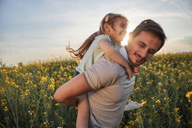 istock Father and daughter enjoying nature 2163372403