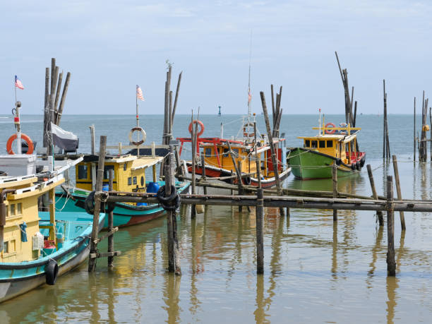 istock Fishing boat mooring 2163373425
