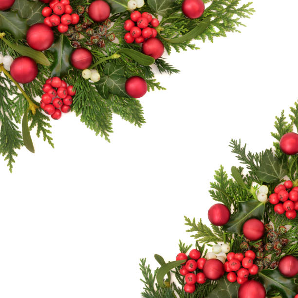 istock Winter Greenery Christmas Red Bauble Floral Background 2163377361