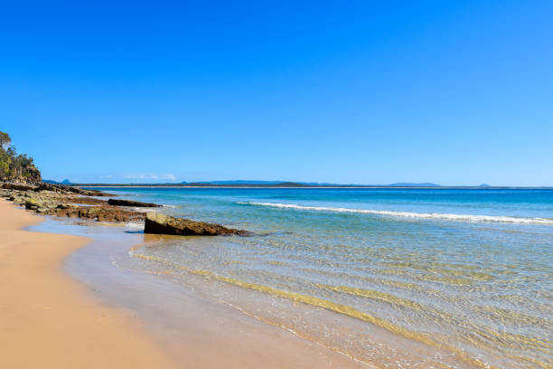 istock Landscape beautiful summer horizontal horizon look view tropical shore open sea beach cloud clean blue sky background calm nature ocean wave water nobody travel sun day time holiday at Australia. 2163377874