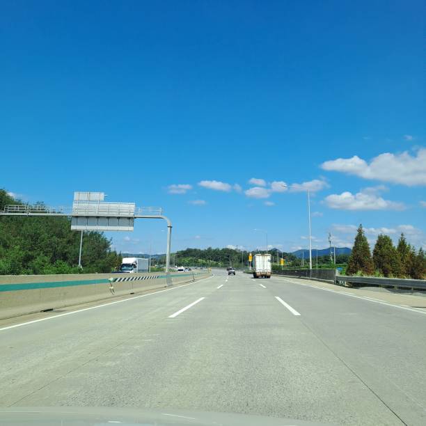 istock Sunny Day on Express Way In South Korea 2163379095