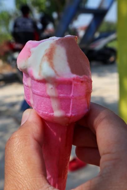 istock ice cream held by a small child 2163381956