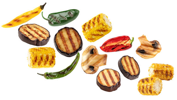 istock flying grilled vegetables isolated on white background. corn, pepper, mushrooms  clipping path 2163382898