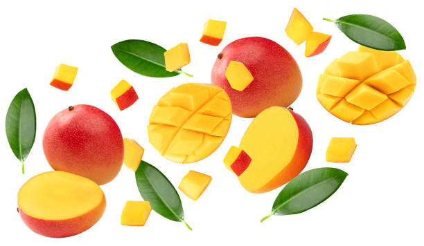 istock flying mango with slices and green leaves isolated on white background. clipping path 2163383035