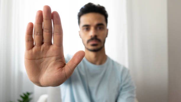 istock Man making stop sign with his hand 2163383208