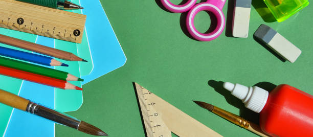 istock Back to school, Knowledge Day, September 1st. school stationery, pencils, notebooks, pens, brushes, educational process. background for the design. 2163386839