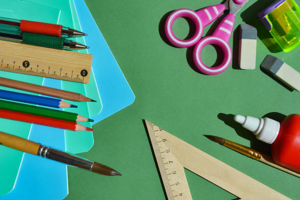istock Back to school, Knowledge Day, September 1st. school stationery, pencils, notebooks, pens, brushes, educational process. background for the design. 2163386856