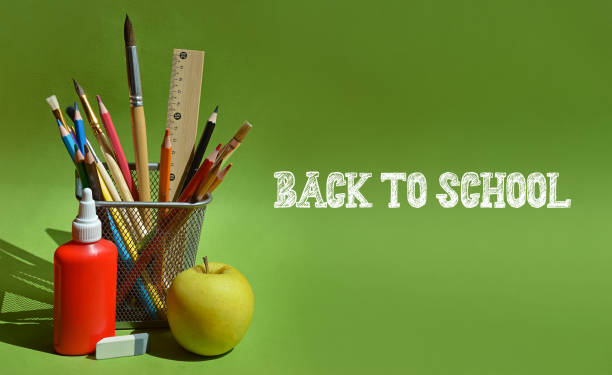istock Back to school, Knowledge Day, September 1st. school stationery, pencils, notebooks, pens, brushes, educational process. background for the design. 2163386932