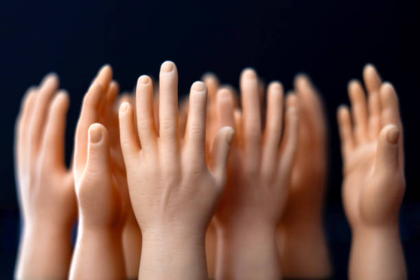 help, assistance, harmony, diversity concept; tiny finger hands.