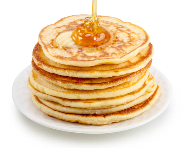 istock Honey pouring on the stack of pancakes on white plate. File contains clipping path. 2163390585