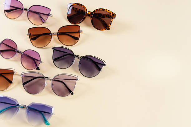 istock Different sunglasses on yellow background. Summer banner. Copy space. Optic shop 2163392921