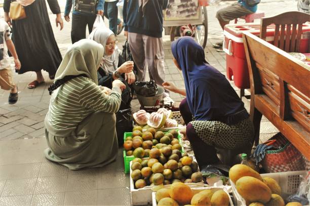 istock Shopping in traditional market. 2163393852