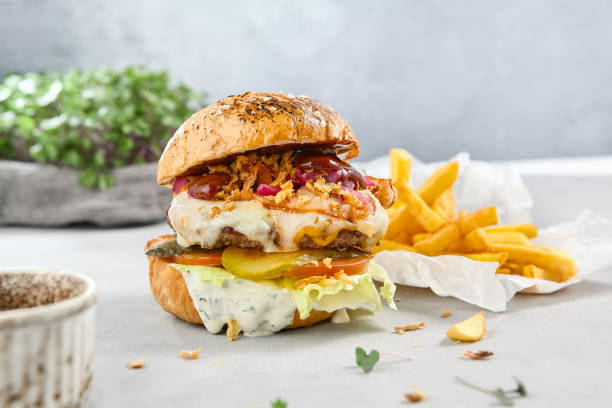 Gourmet Burger with Patty, Two Sauces, and Fresh Toppings