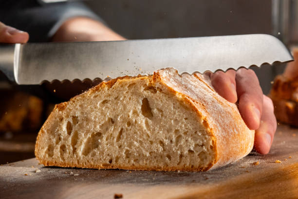 istock Slicing Fresh Bread at Home 2163396906