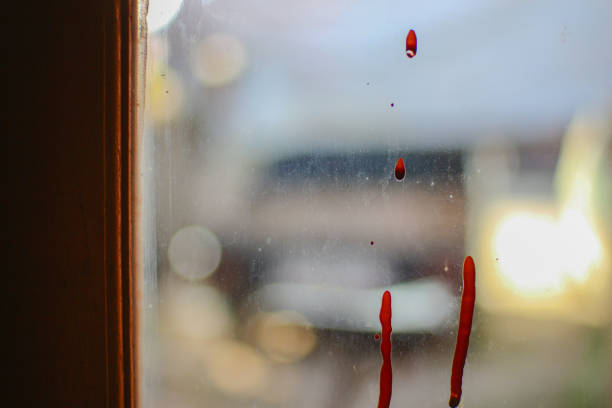 Picture of a hand print on condensation covered glass.