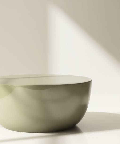 istock Modern shiny olive green podium table on floor in sunlight on cream white wall 2163397806