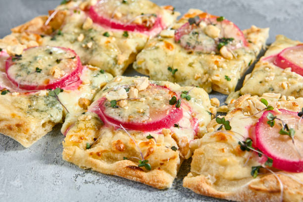istock Pear and Gorgonzola Flatbread Pizza with Blue Cheese and Pear Slices 2163399219