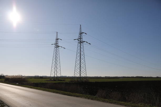 istock High-Voltage Power Line in a Field with the Sky in the Background 2163403786