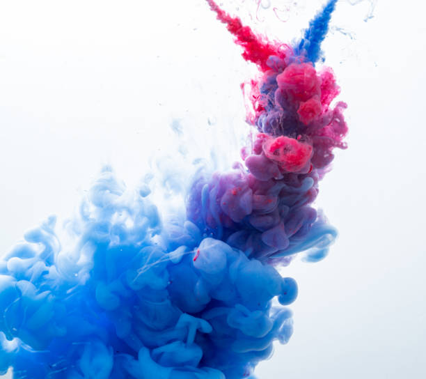 istock red and blue paint mixing underwater 2163407022