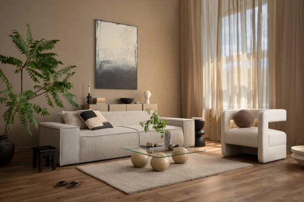 istock Creative composition of cozy living room interior with mock up poster frame, with mock up poster frame, modular sofa, beige curtain, stylish coffee table and personal accessories. Home decor Template. 2163407185