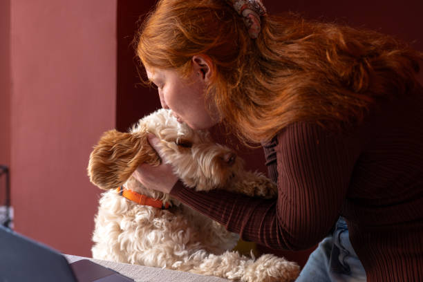 istock Tiume At Home With My Pooch 2163407354