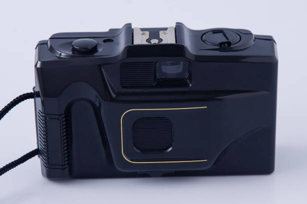 istock Old film camera on white background 2163408866
