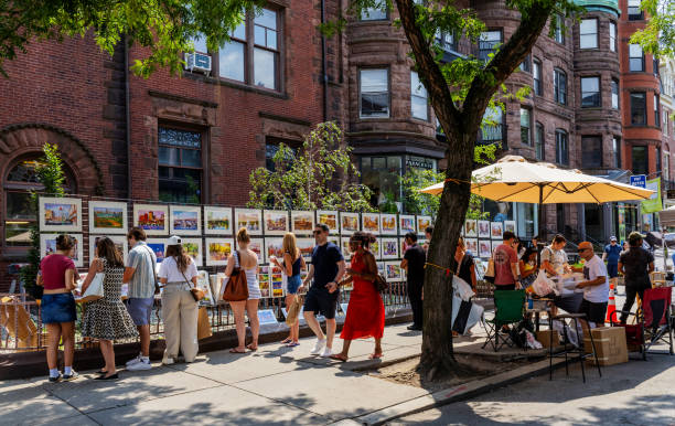Souvenir Boston prints on sale from sidewalk gallery vendor - Newbury Street - Back Bay - Boston Massachusetts stock photo