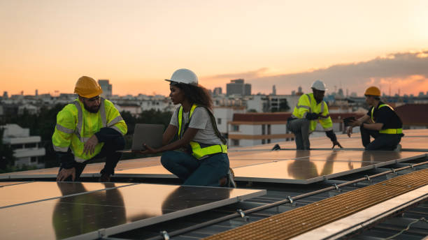 istock Service engineer checking solar cell on the roof for maintenance if there is a damaged part. Engineer worker install solar panel. Clean energy concept. 2163419340