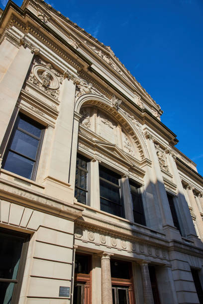 istock Neoclassical Courthouse Facade with Corinthian Columns Against Blue Sky 2163424543