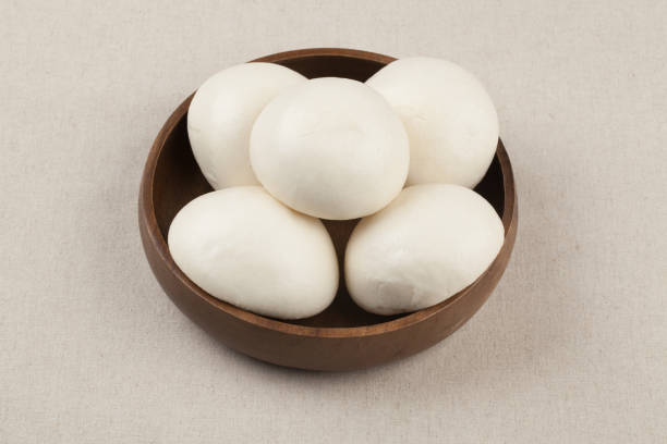 istock Hoppang is a bread made by putting fillings such as red beans or vegetables into flour dough and steaming it. 2163431449