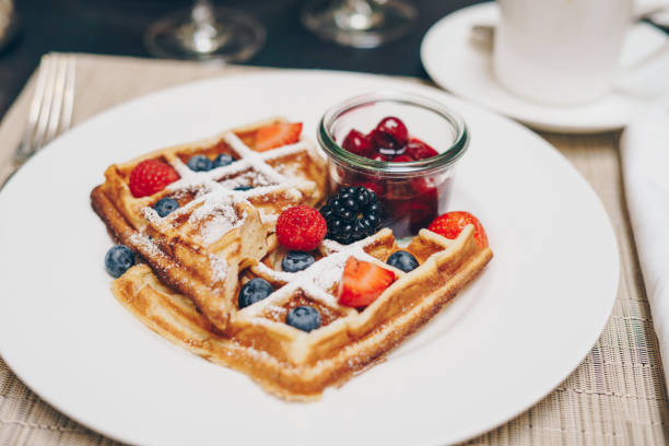 istock Belgian waffles with fresh strawberries and blueberries 2163431998