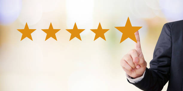 istock Customer Experience, A user give excellent rating to product and service experience, Customer review for satisfaction feedback, Customer evaluate quality of service and product 2163438874
