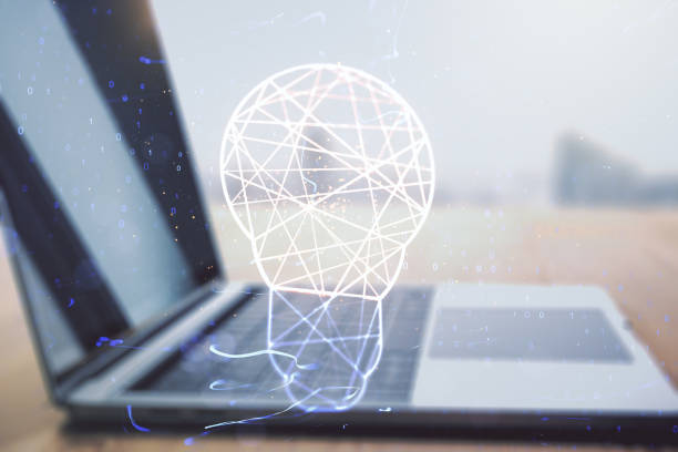 istock Double exposure of creative light bulb hologram on laptop background, research and development concept 2163445084