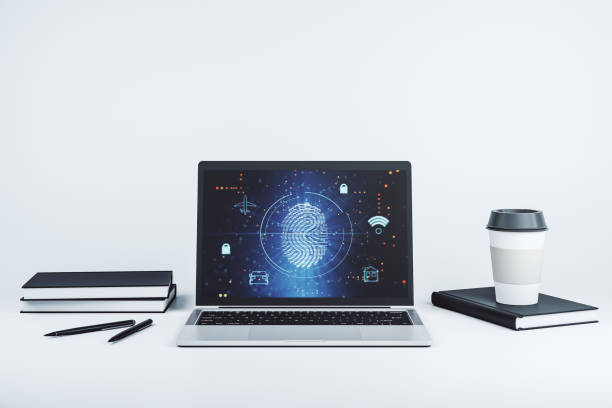 istock Modern computer screen with creative fingerprint hologram, personal biometric data concept. 3D Rendering 2163445115