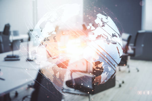 istock Multi exposure of abstract creative digital world map hologram on modern corporate office background, research and analytics concept 2163445161