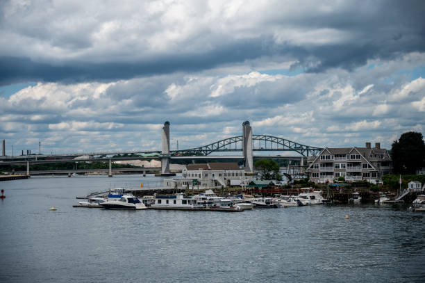 Piscataqua river and Sarah Mildred Long Bridge from Memorial bridge in Portsmouth, New Hampshire, during summer day