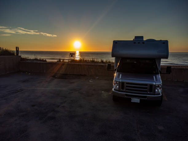 istock Sunrise and motorhome 2163451939