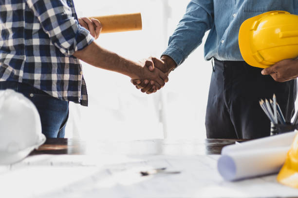 istock Collaboration with colleagues, architects, engineers and contractors. 2163457496