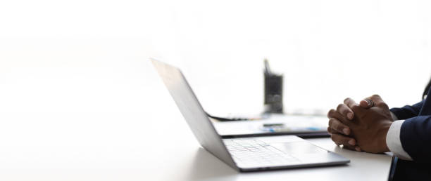 istock Businessman hands working with laptop. 2163457631