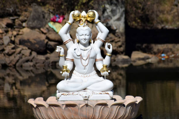 Lord Shiva statue made of white stone, prayered by hindu in sawan month, this month belongs to lord Shiva